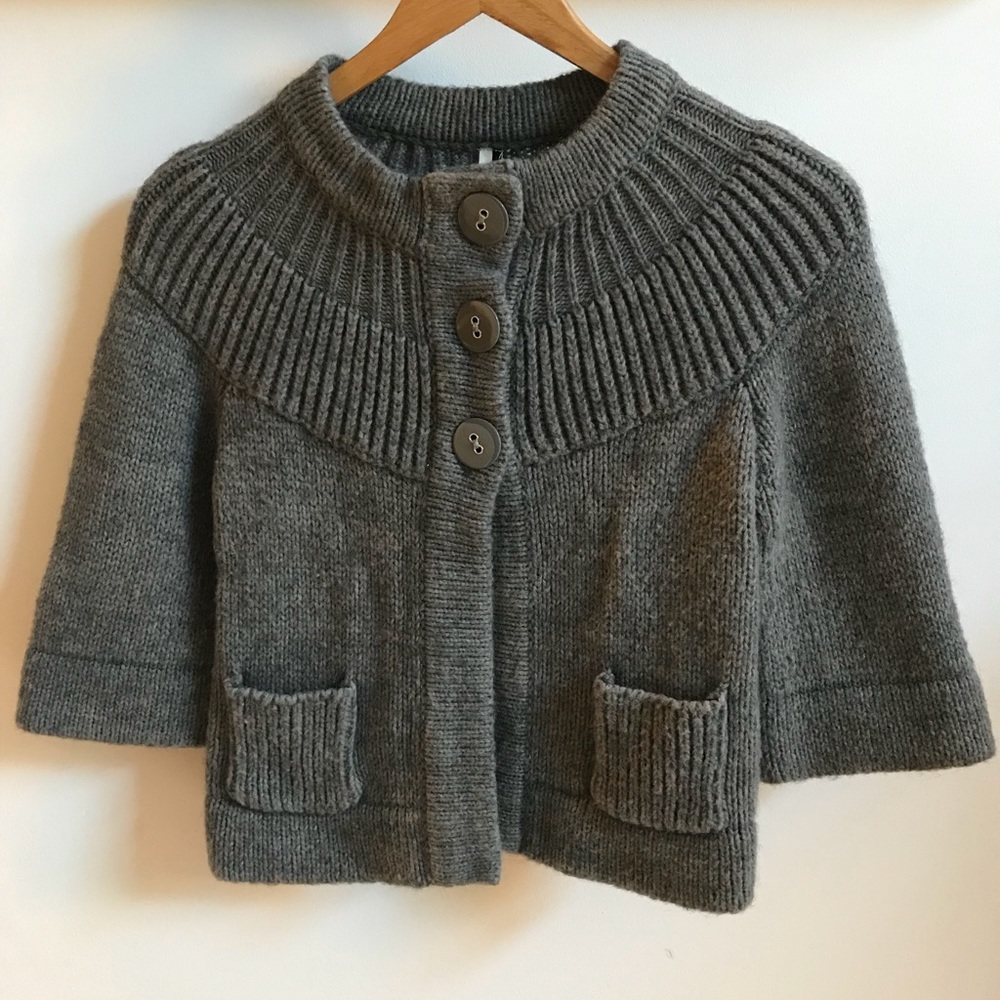 Short poncho sweater
